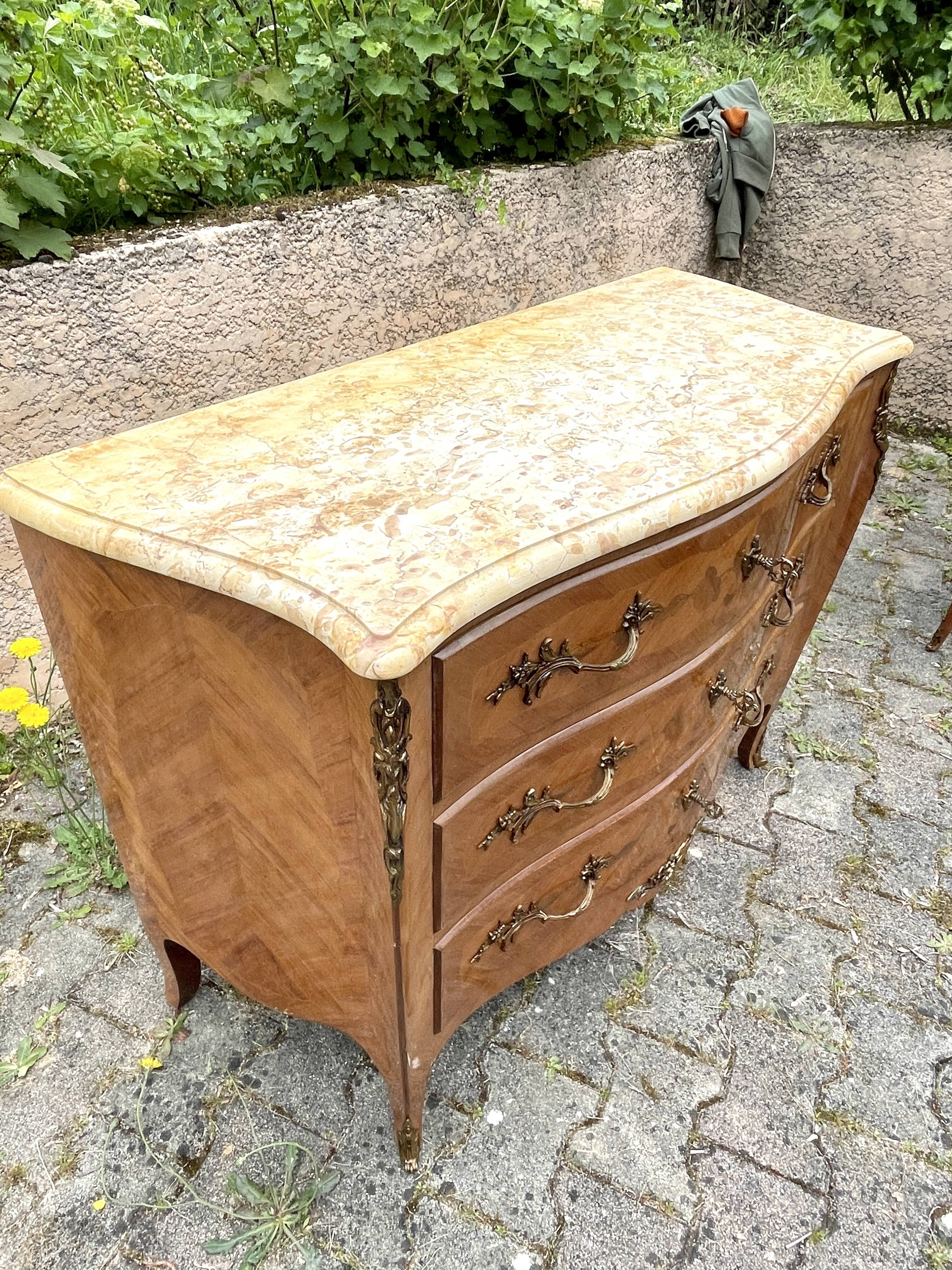 Louis XV style commode in marquetry, 20th century.