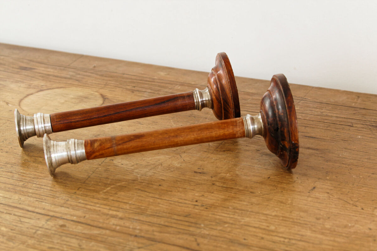 Pair of Indian candle holders, wood and silver metal