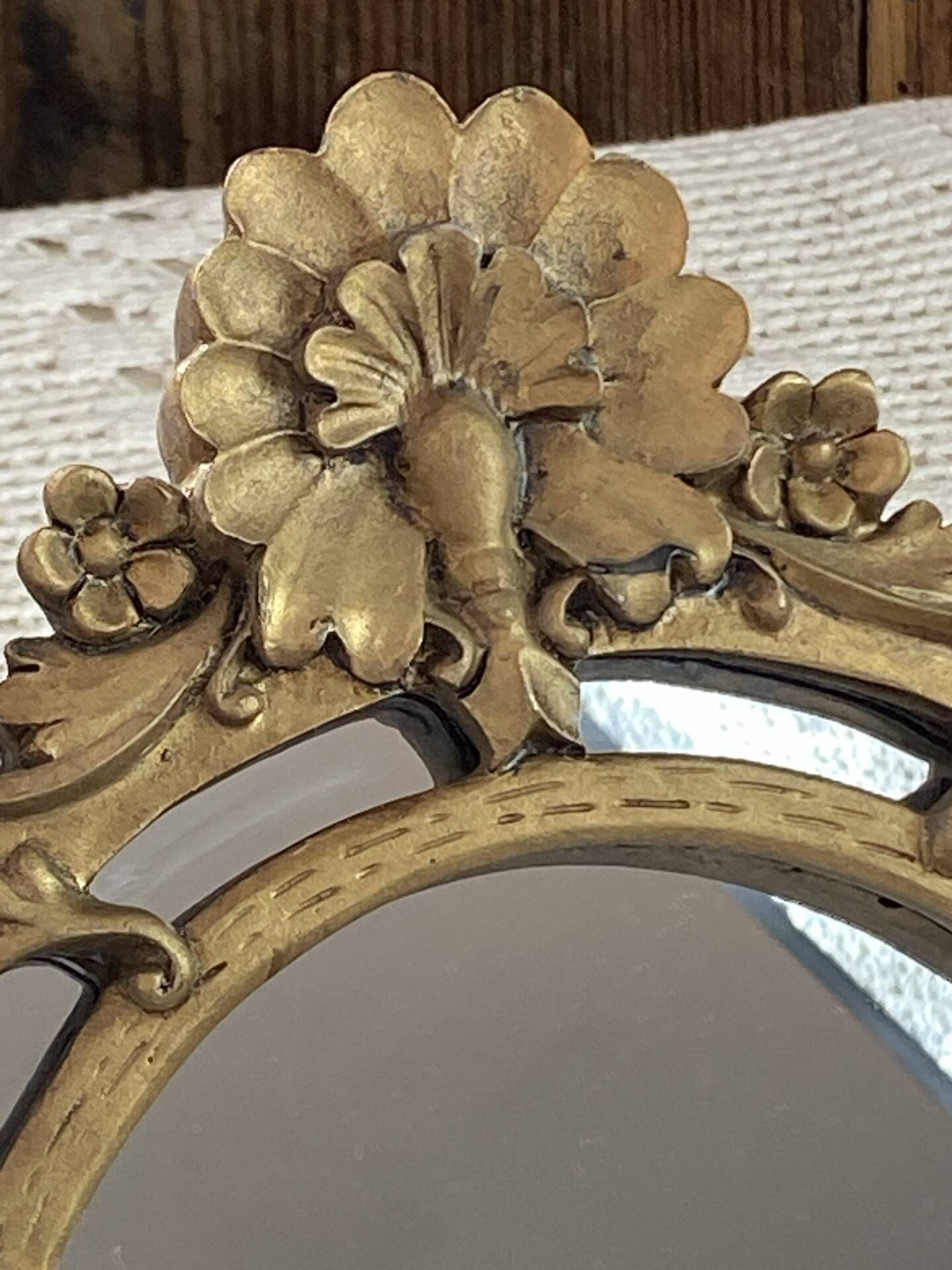 Baroque style mirror, decorated with shells and flowers.