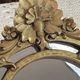 Baroque style mirror, decorated with shells and flowers.