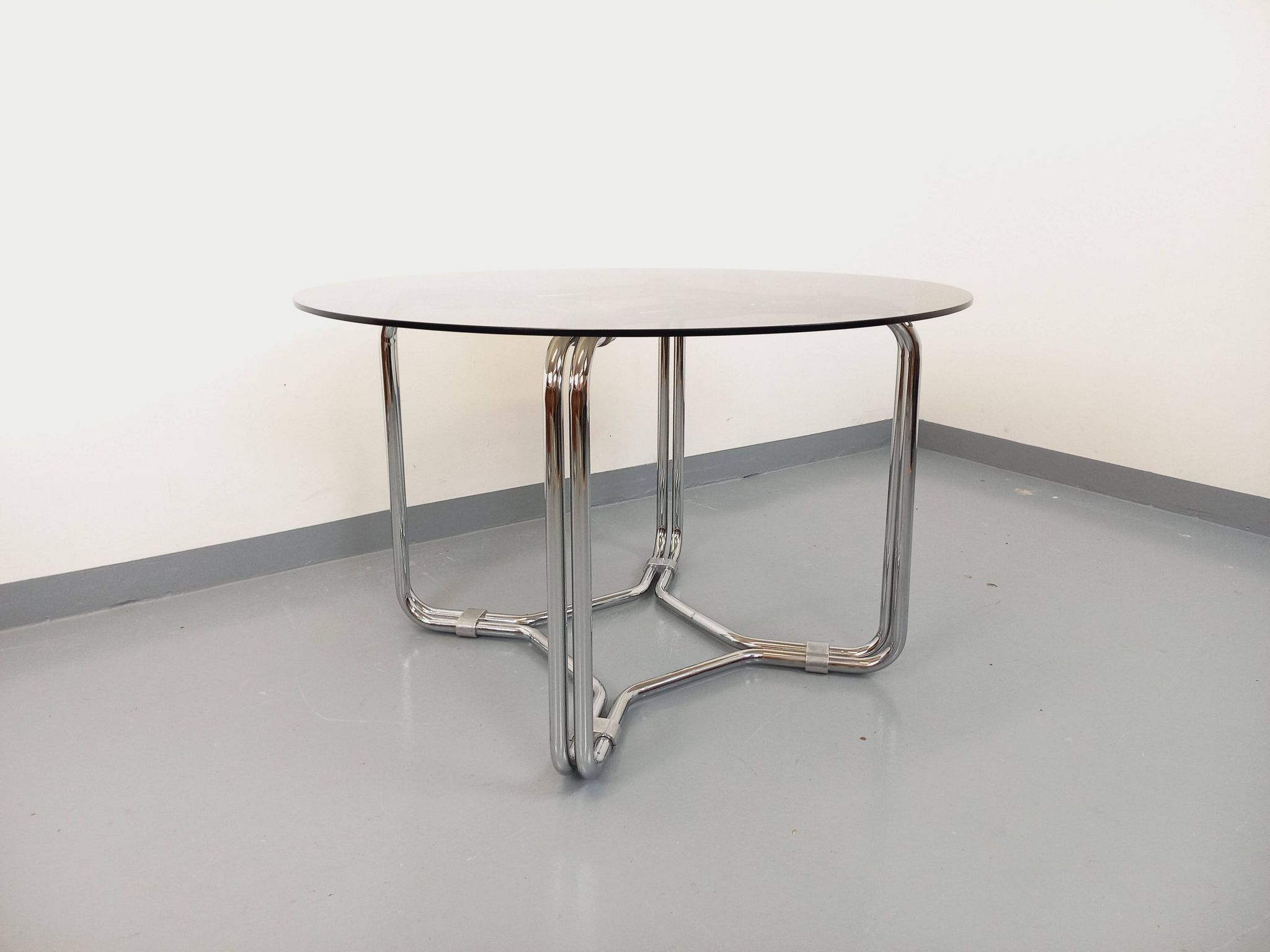 Vintage round dining table in smoked glass and chrome metal