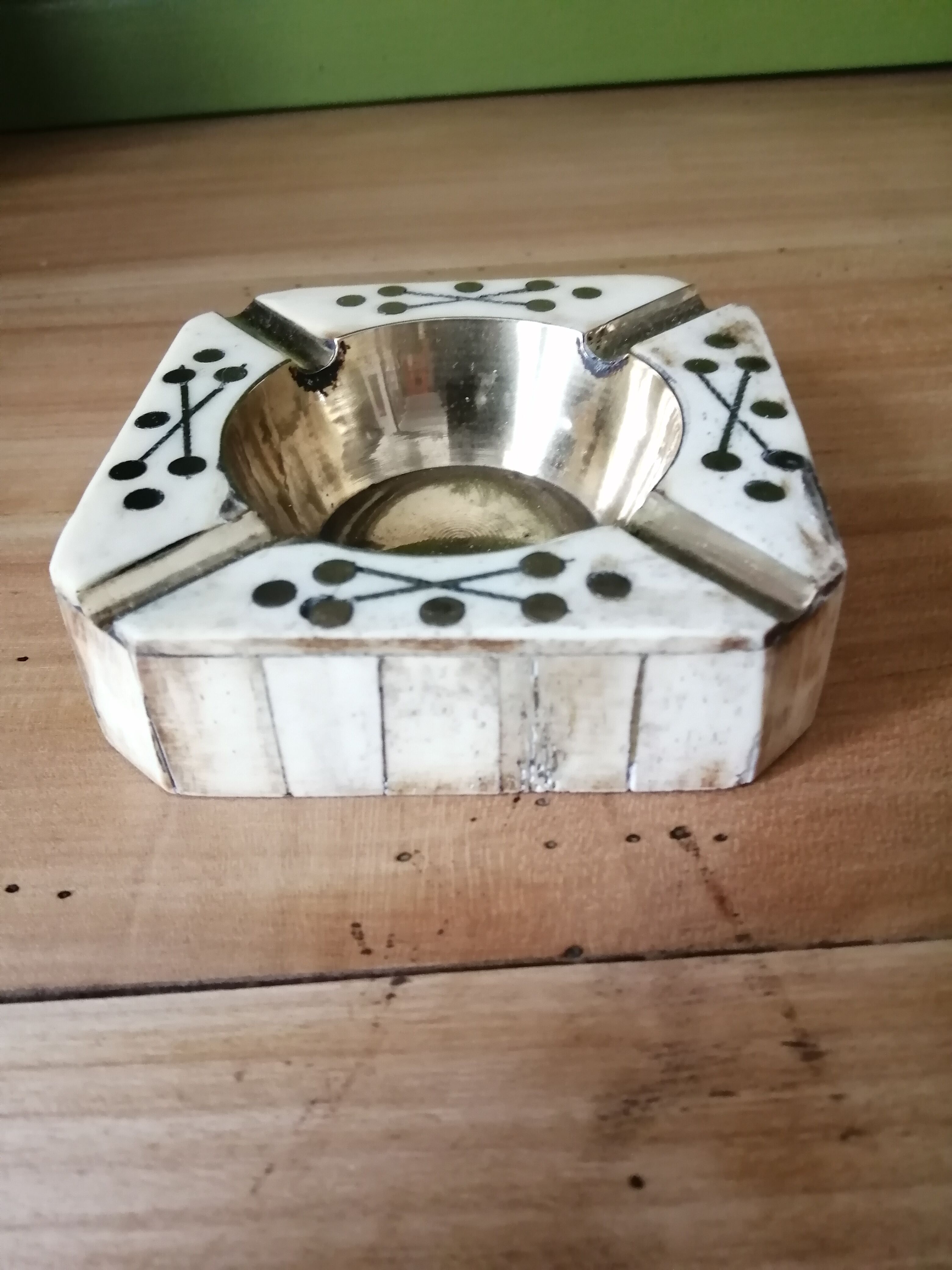 Brass and bone ashtray