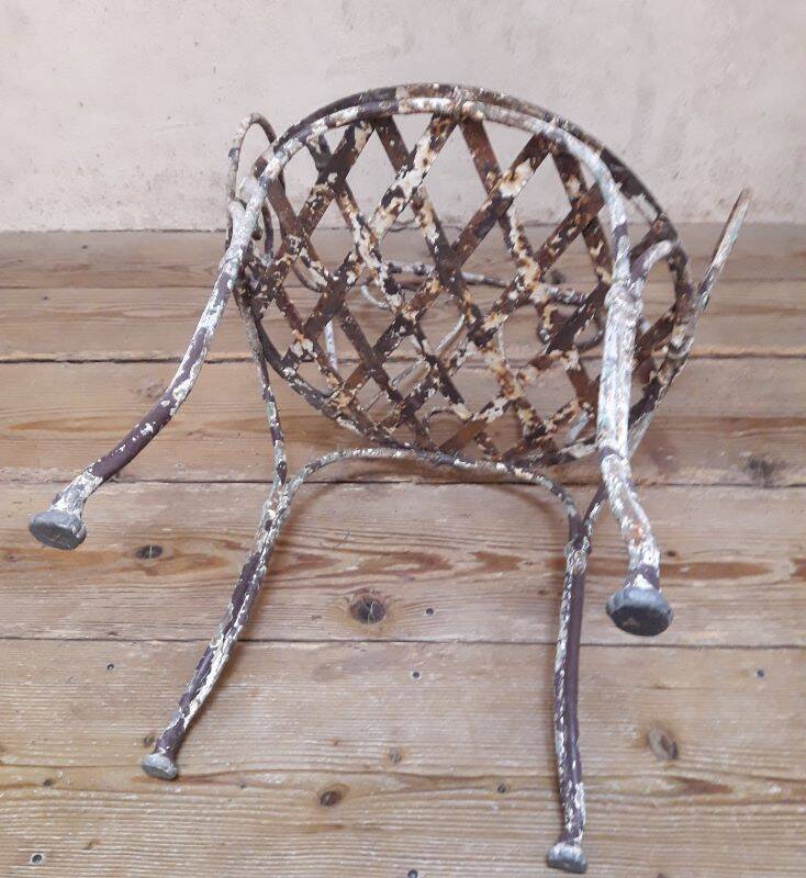 19th-century garden armchair in wrought iron