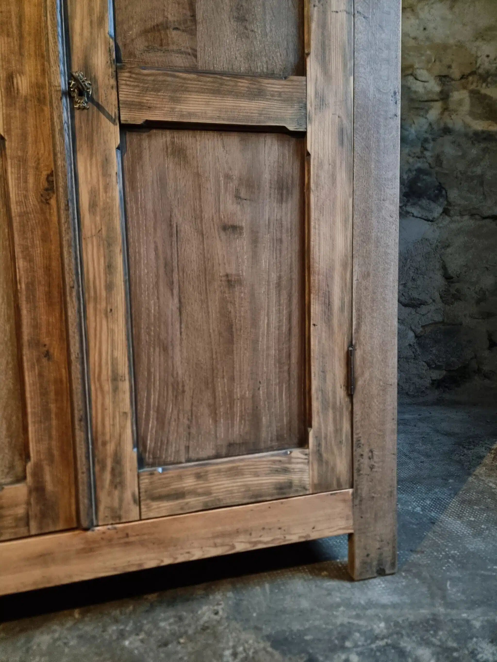 Antique French wardrobe in oak and pine, late 19th century.
