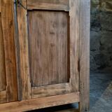 Antique French wardrobe in oak and pine, late 19th century.