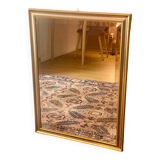 Beveled mirror with gold borders