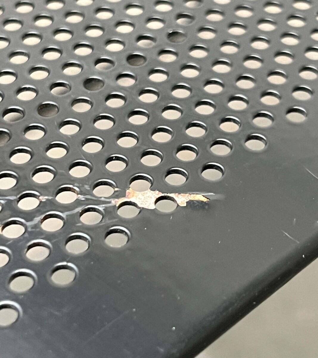 Postmodern perforated metal nesting side table from Ikea, 1980s.