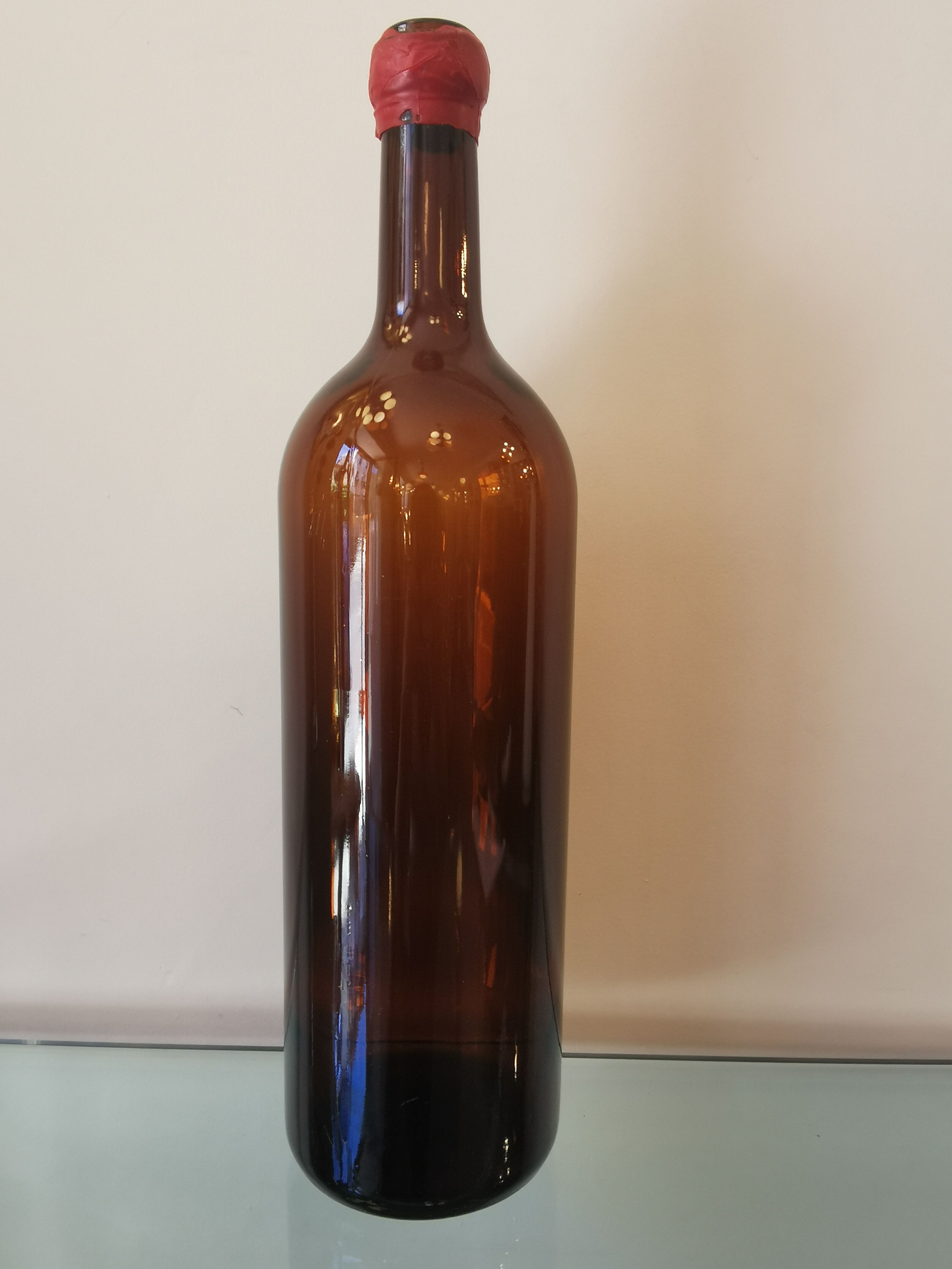 Vintage xxl bottle (46cm)in amber blown glass