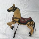 Wooden horse with period ironwork support