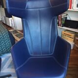 Arrow swivel armchair and foot rests by Alfredo Haberli for Moroso
