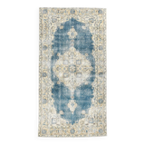 Tapis persan bleu et beige