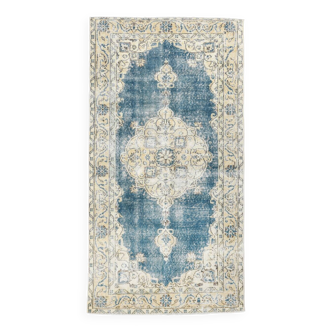 Tapis persan bleu et beige