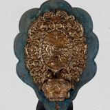 Patinated bronze holy water font