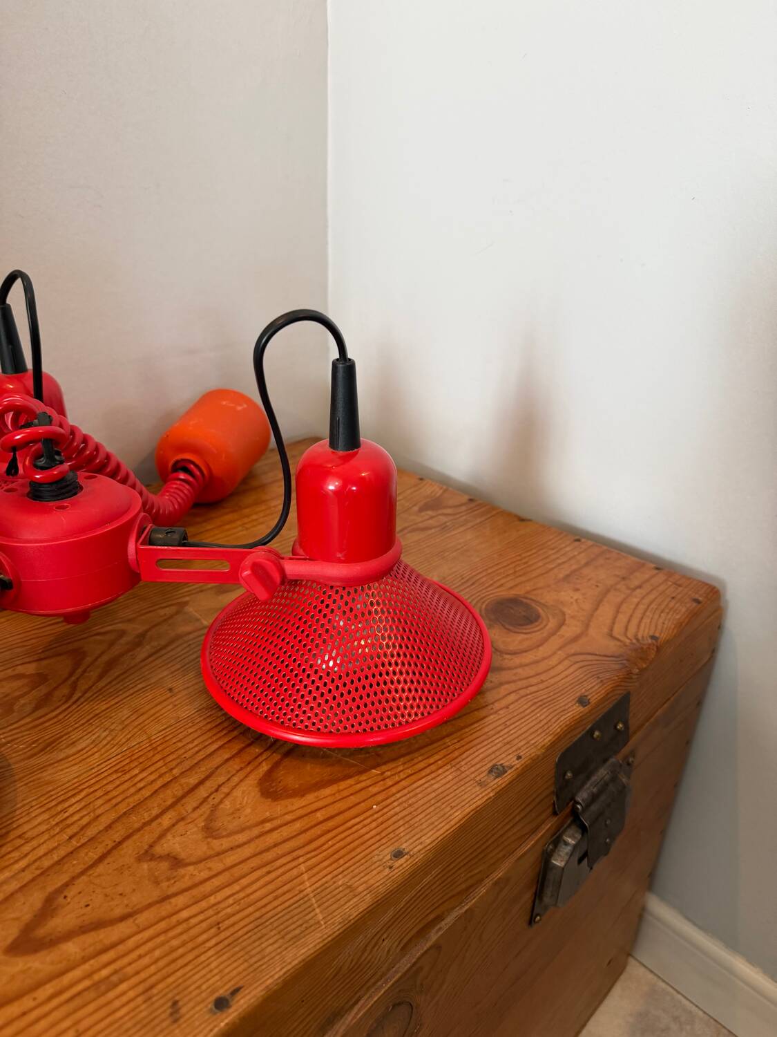 Three-lamp suspension in Memphis design style in red metal.
