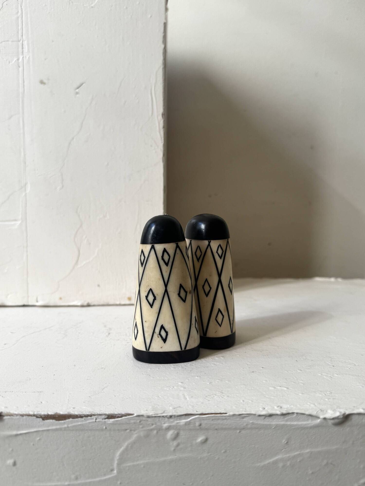 Art Deco salt and pepper set in ebony and ivory circa 1950