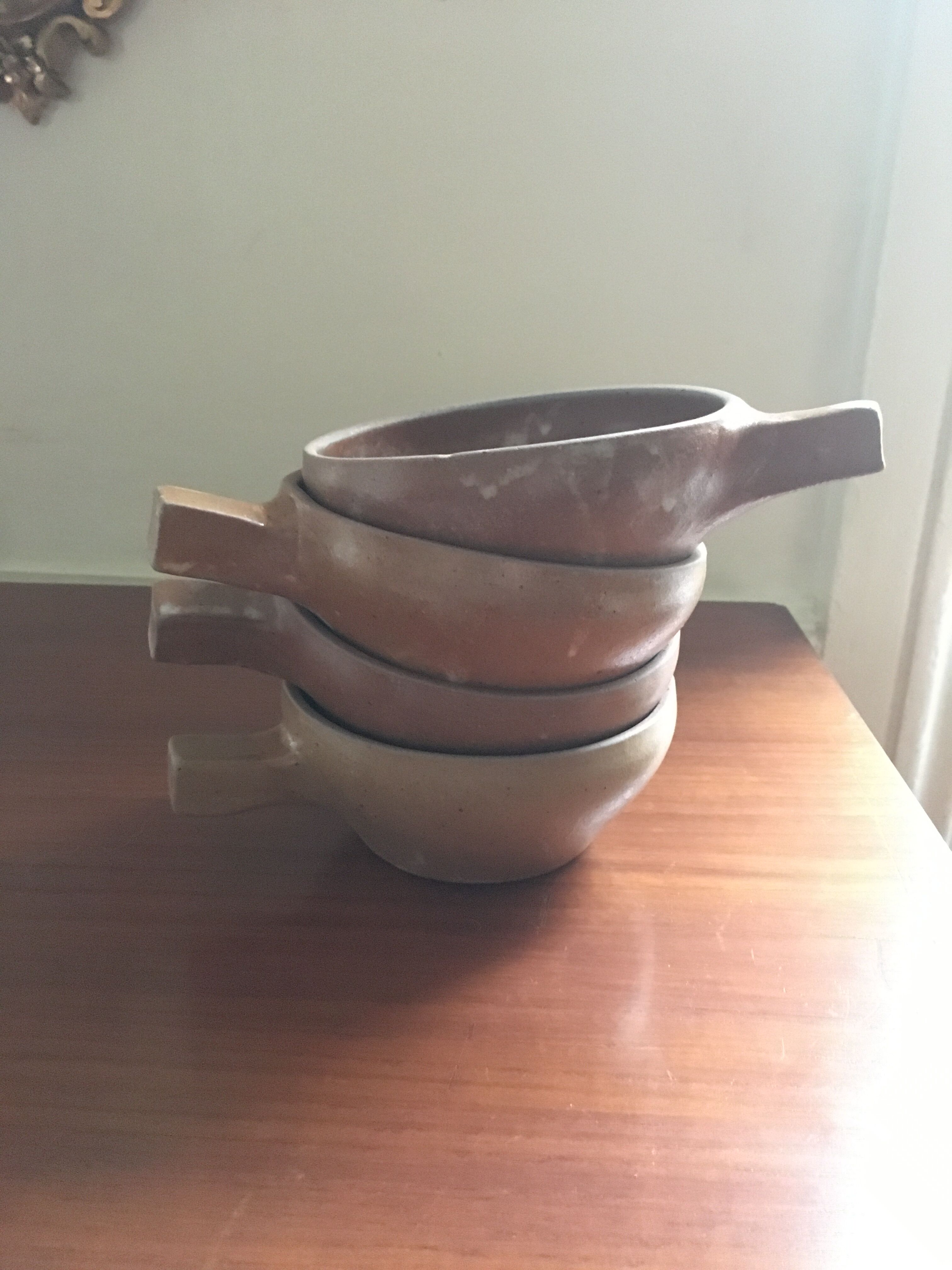 4 enamelled sandstone bowls