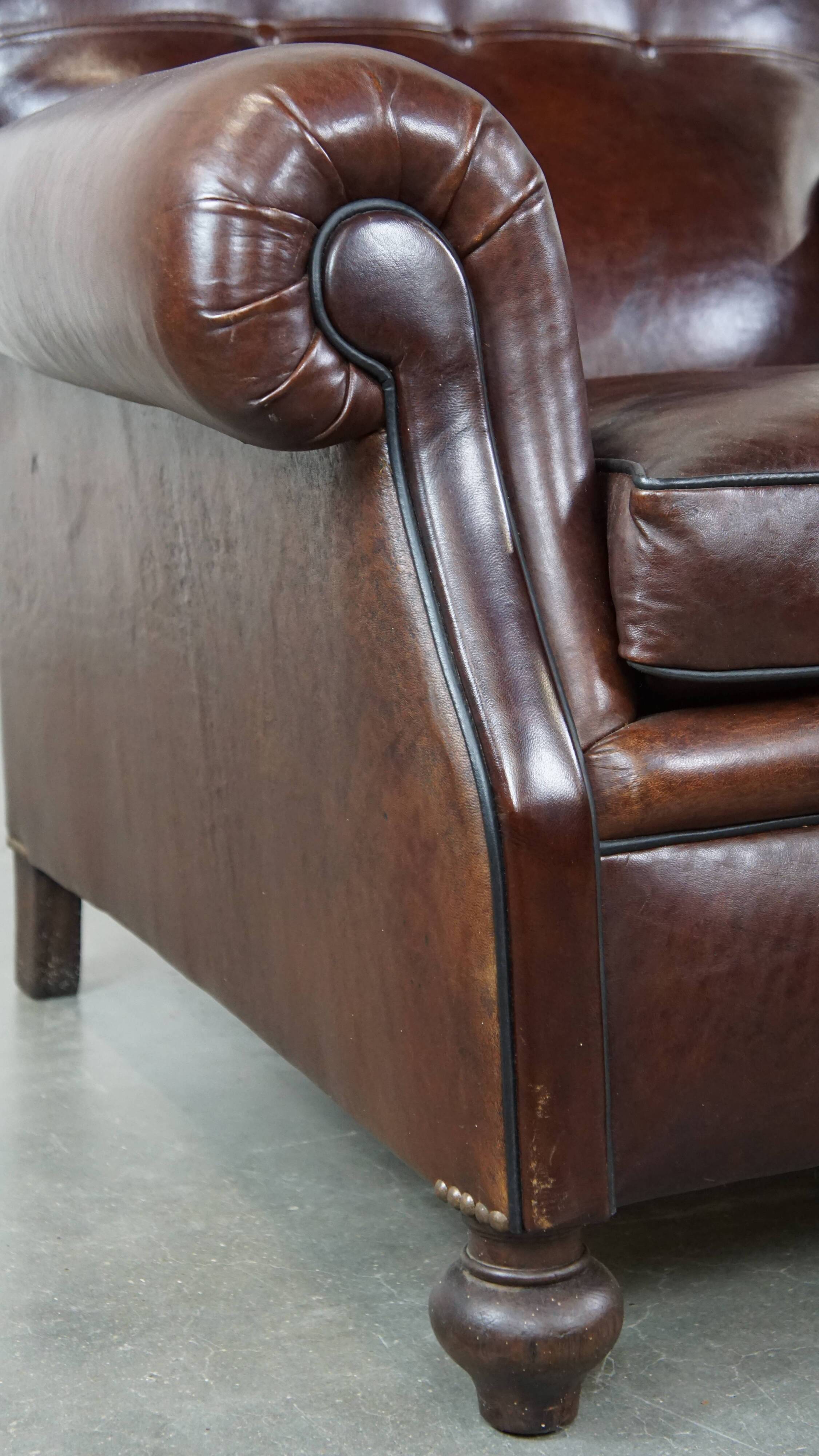 Antique sheep leather English armchair