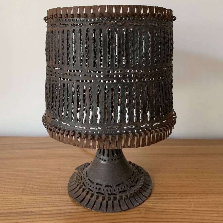 Openwork metal lamp