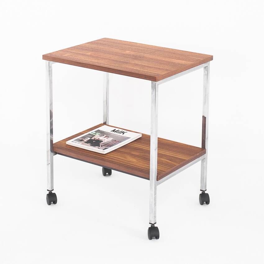 Vintage side table on wheels. Chrome-plated iron tube and wood. France, 1970s.