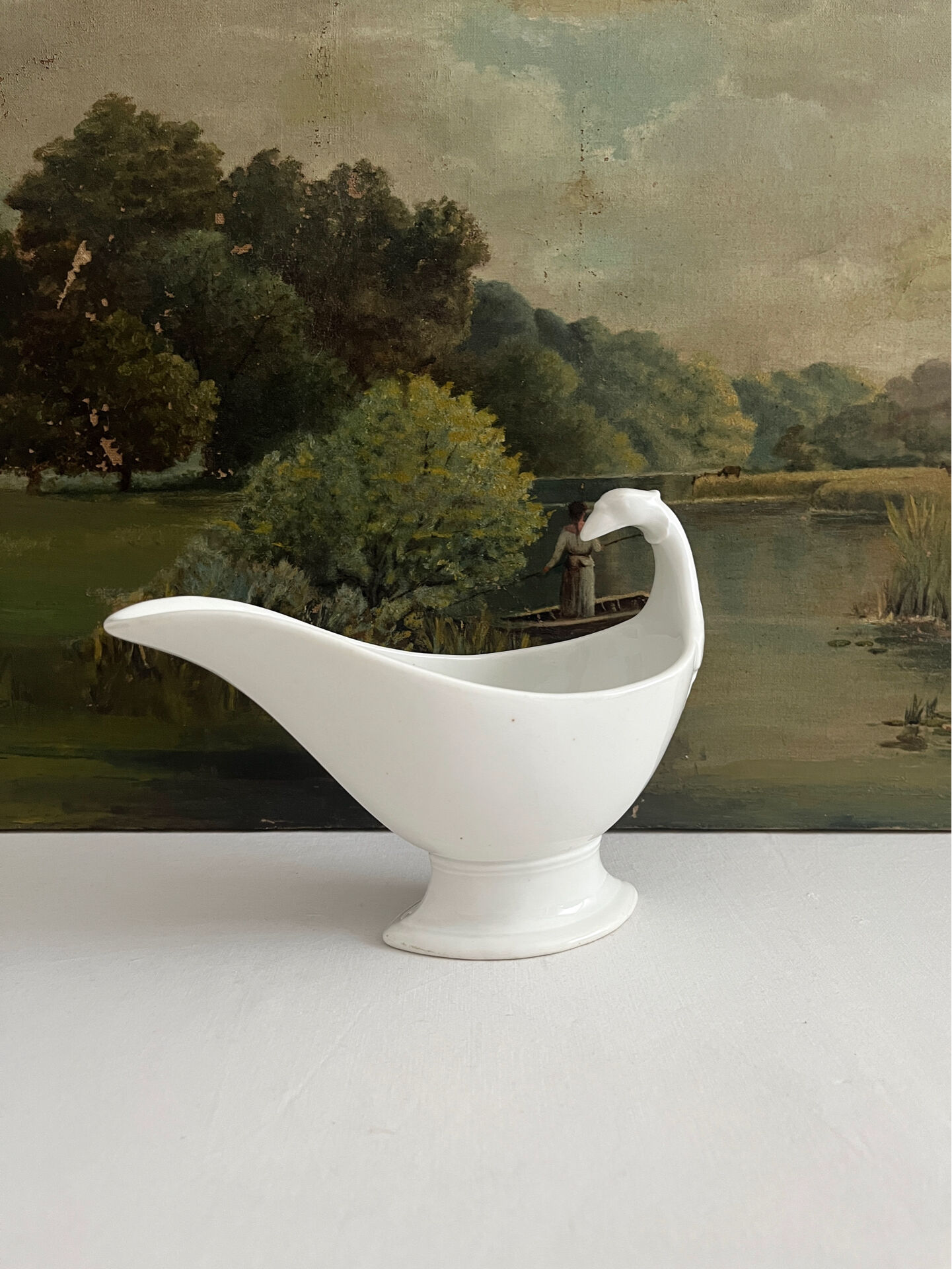 Empire sauce boat with eagle head in antique porcelain