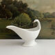 Empire sauce boat with eagle head in antique porcelain