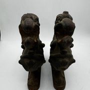 Pair of winged chimera and dragon fire dogs in cast iron
