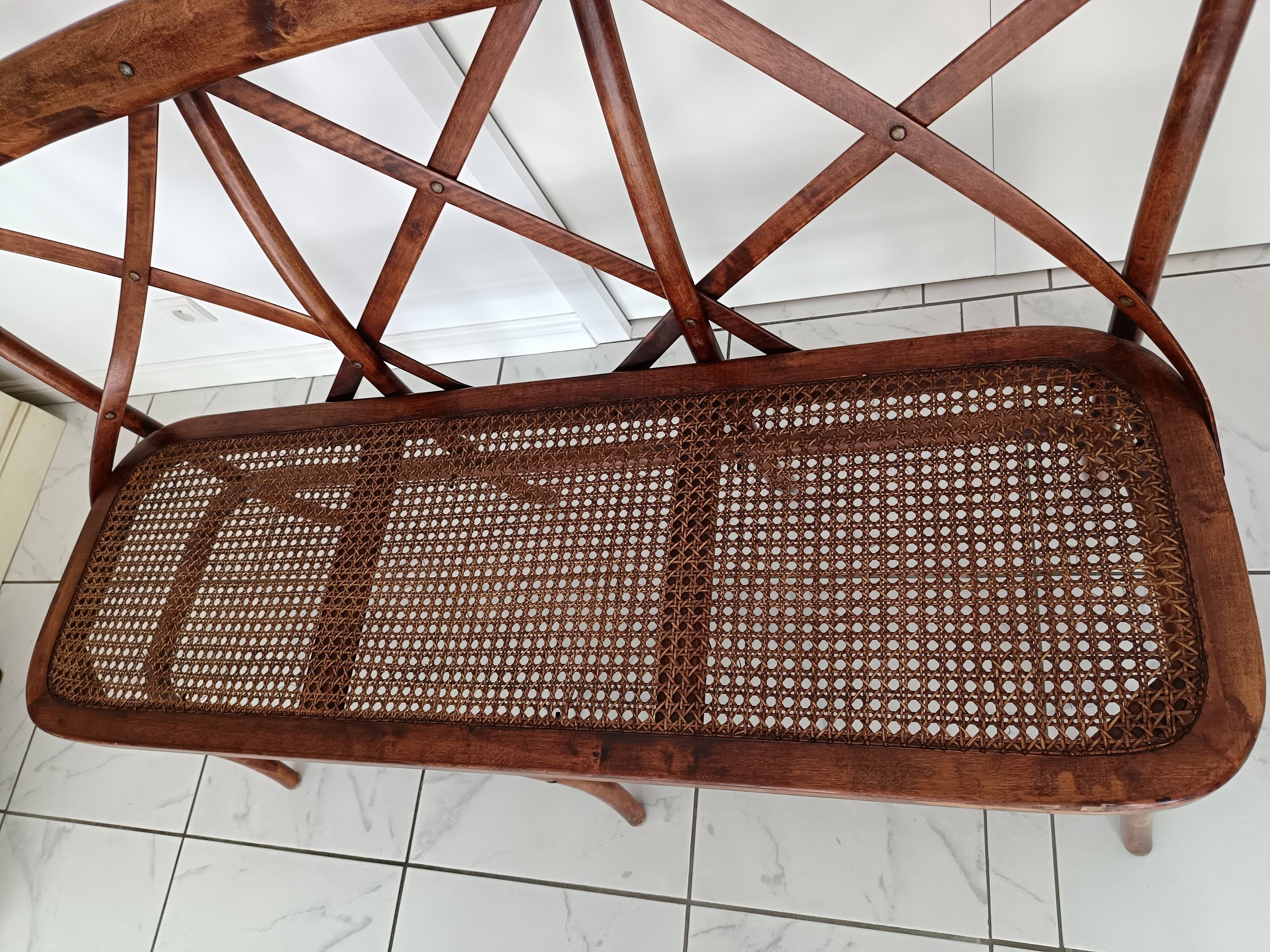 CURVED WOOD AND CANE BENCH