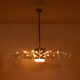 Radiant glass tube chandelier. Contemporary design.