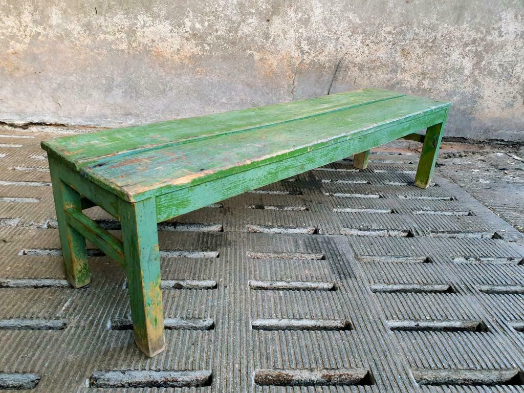 Old wooden bench sidetable green
