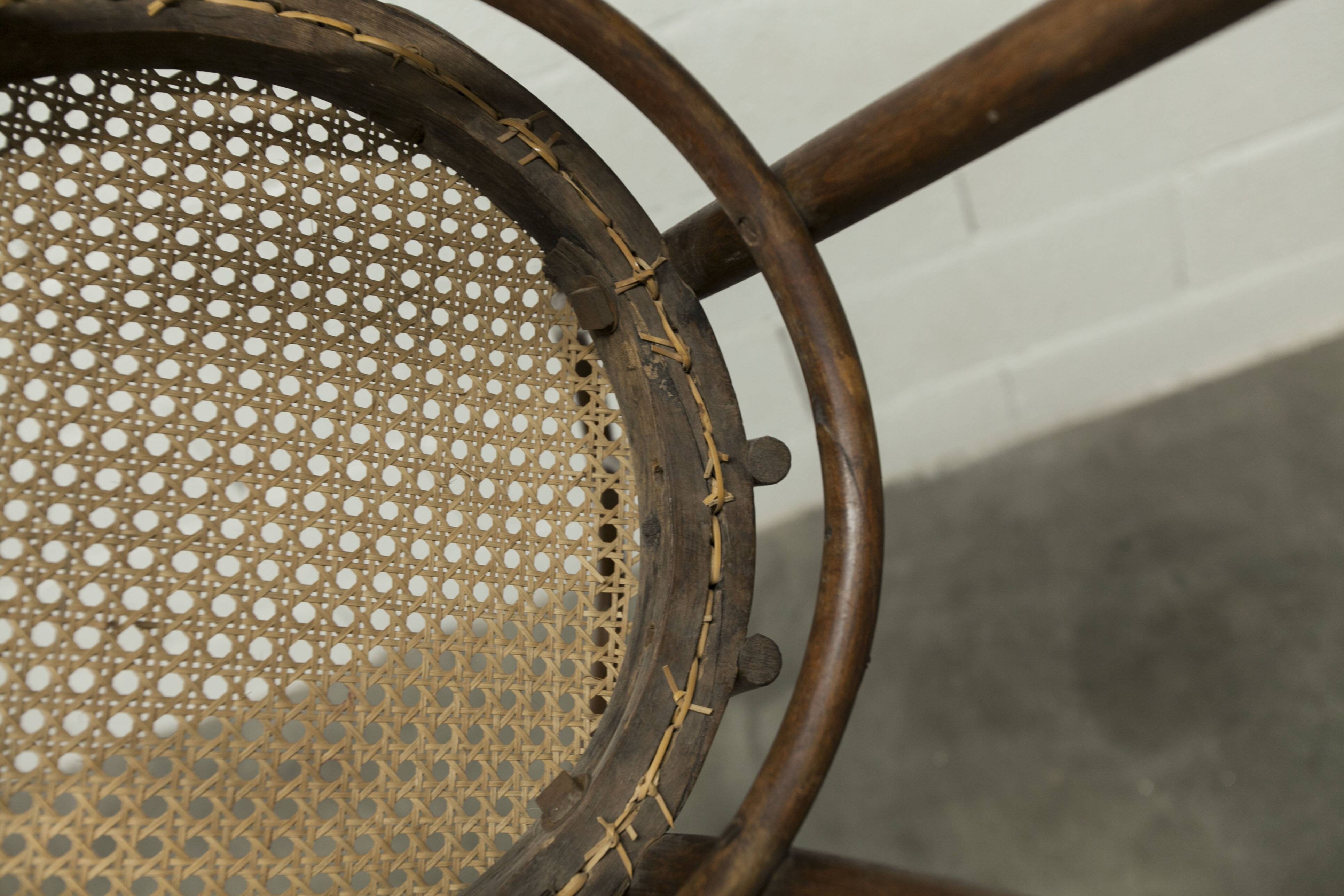 1920s curved wooden cane bistro chair