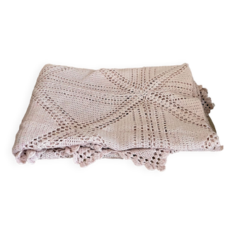 Pale pink crochet bedspread