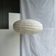 Large oval flat Japanese-style suspension in rattan and natural linen H35 D60.