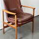 Leather and wood armchair by Ib Kofod Larsen