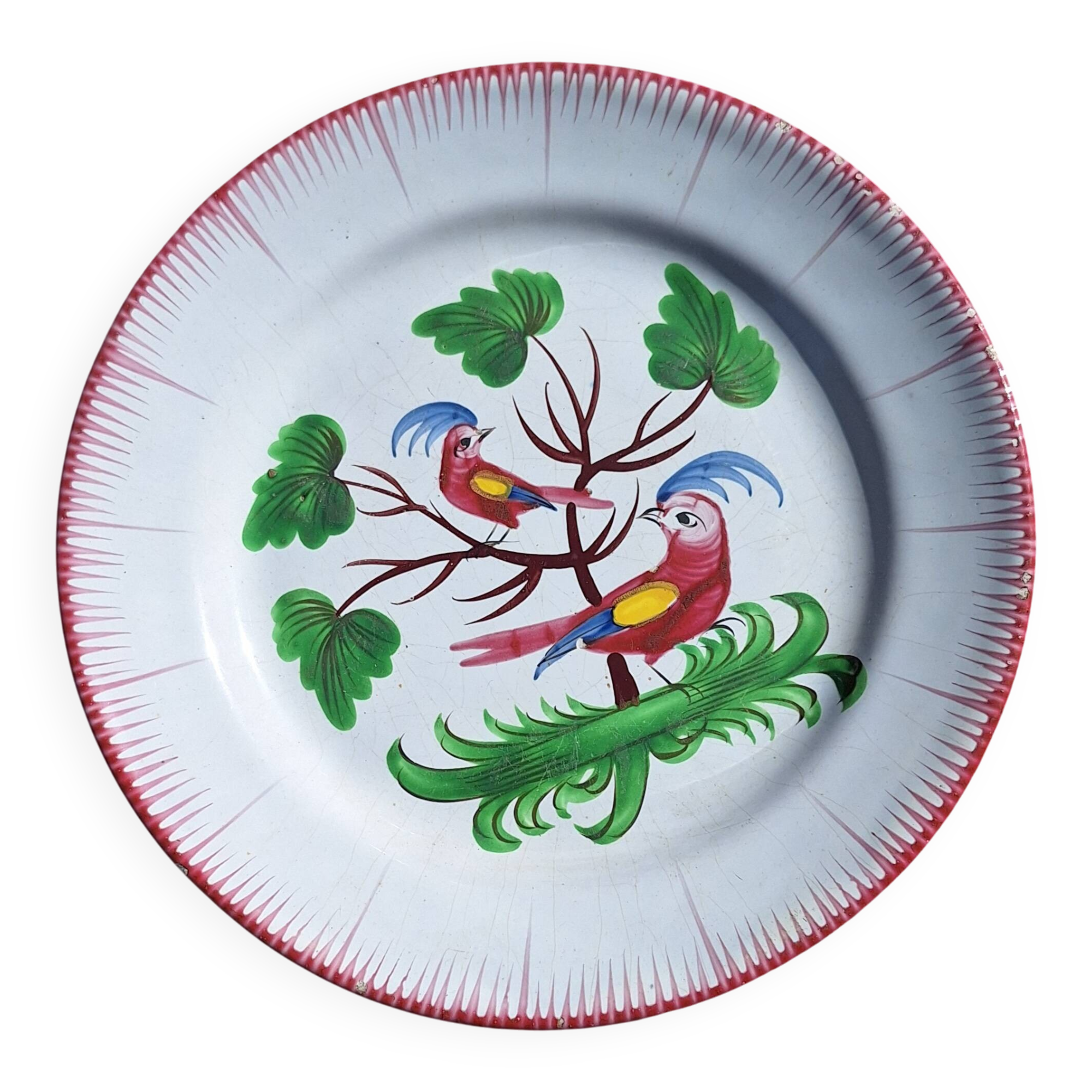 Eighteenth-century earthenware plate decorated with parrots.