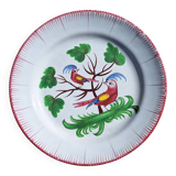 Eighteenth-century earthenware plate decorated with parrots.