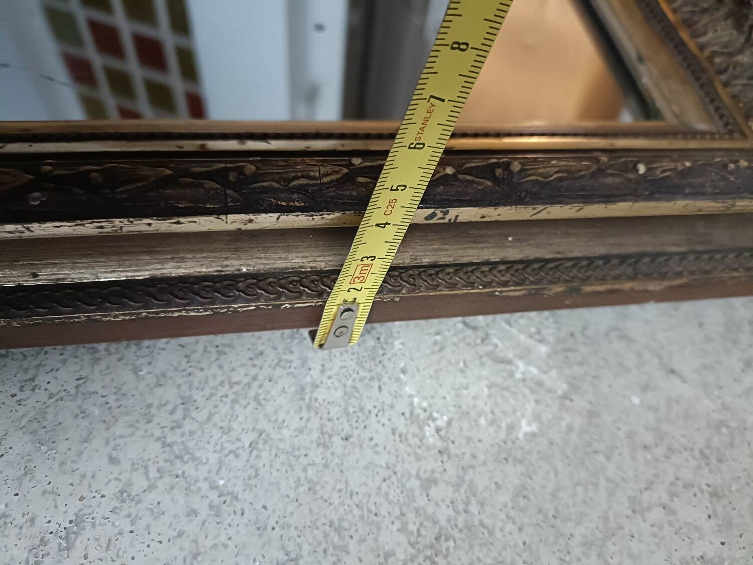 Antique mirror in wood and gilded stucco