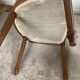 Paire de fauteuils médaillon en bois et velours