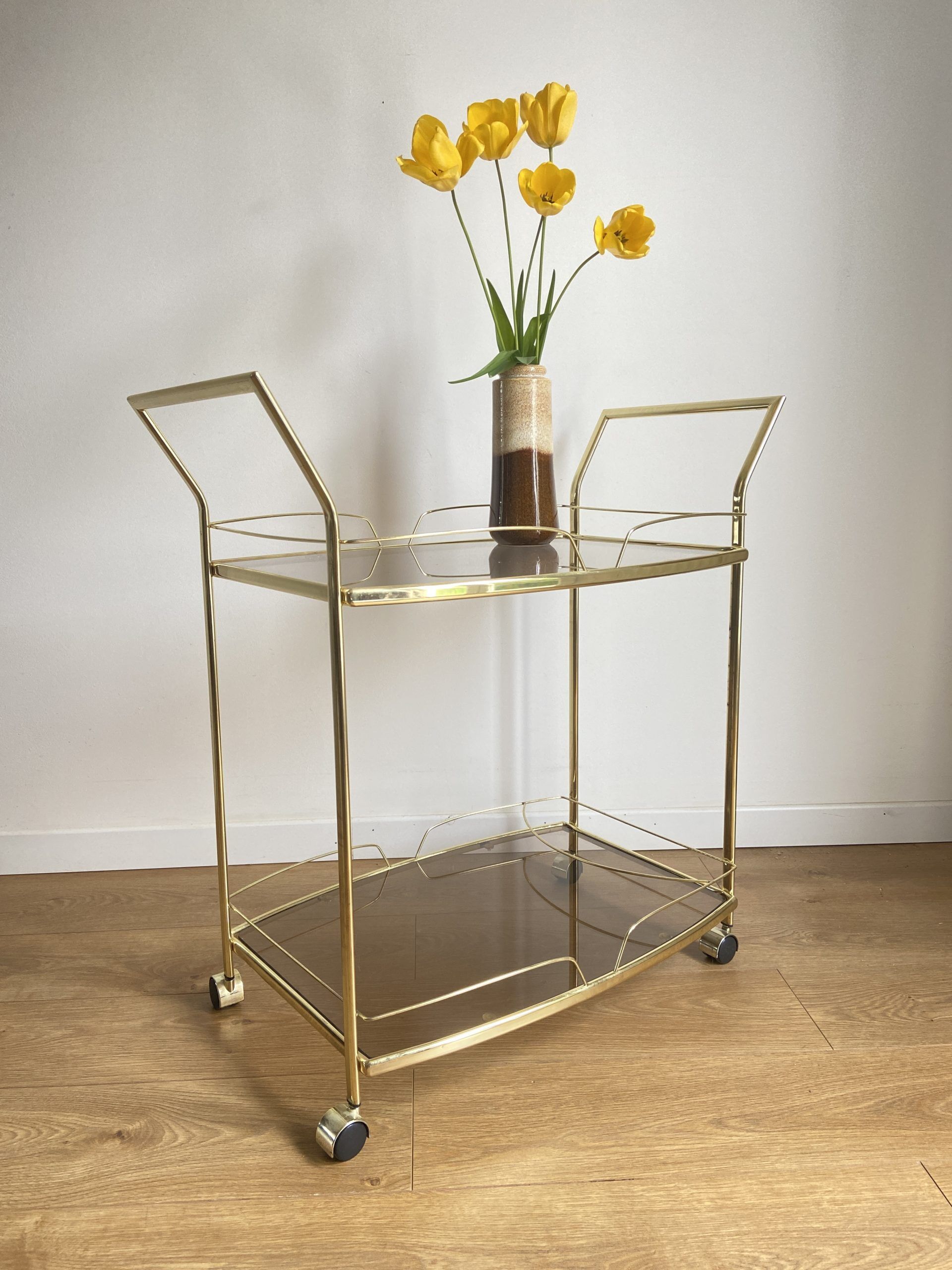 Vintage rolling service in gilded metal and smoked glass