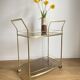 Vintage rolling service in gilded metal and smoked glass
