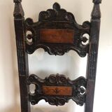 Set of an armchair and a pair of chairs in Italian Renaissance walnut