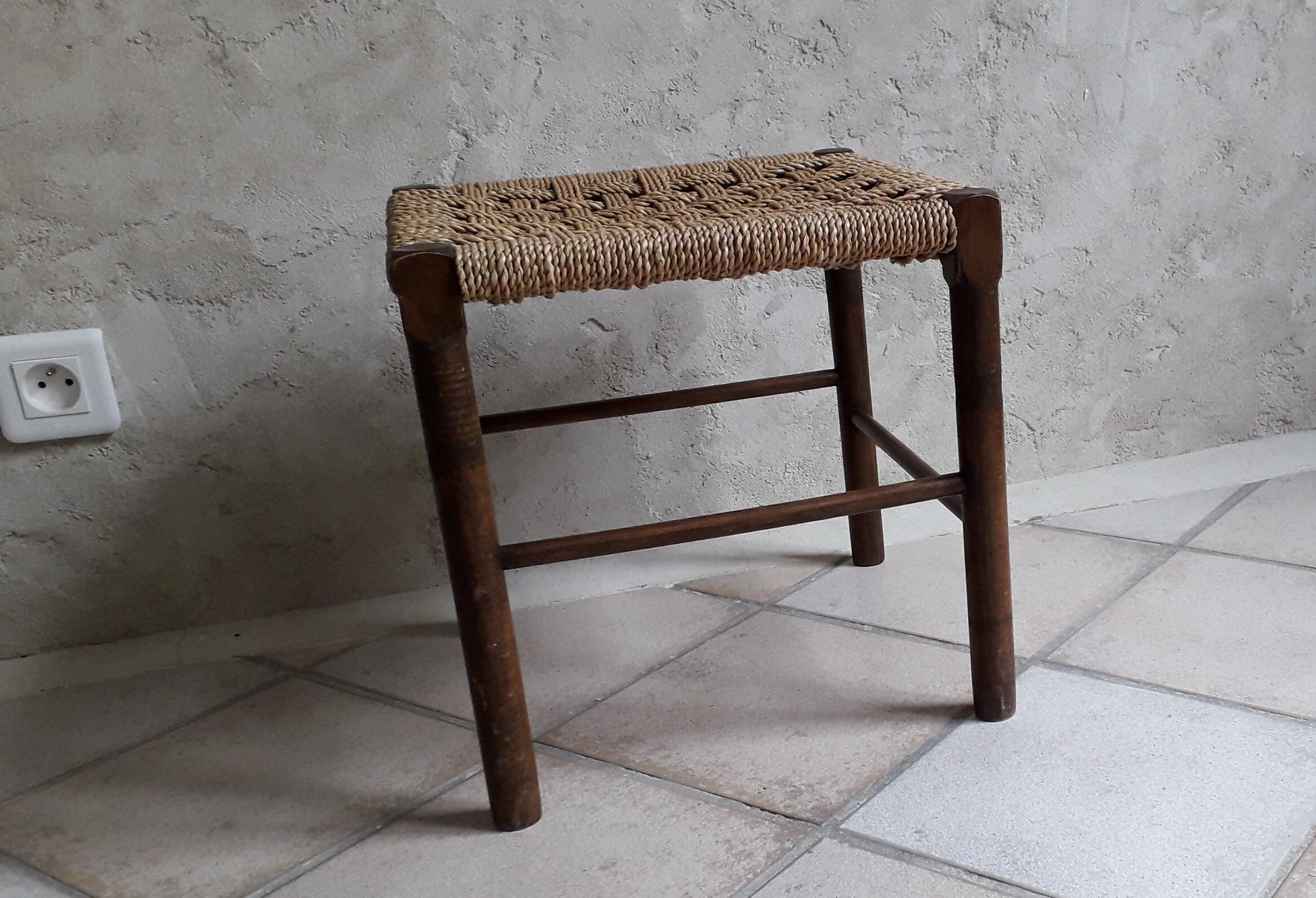 Wooden stool and rope
