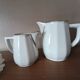 2 white porcelain milk jugs with platinum trim, Flora by Apilco.