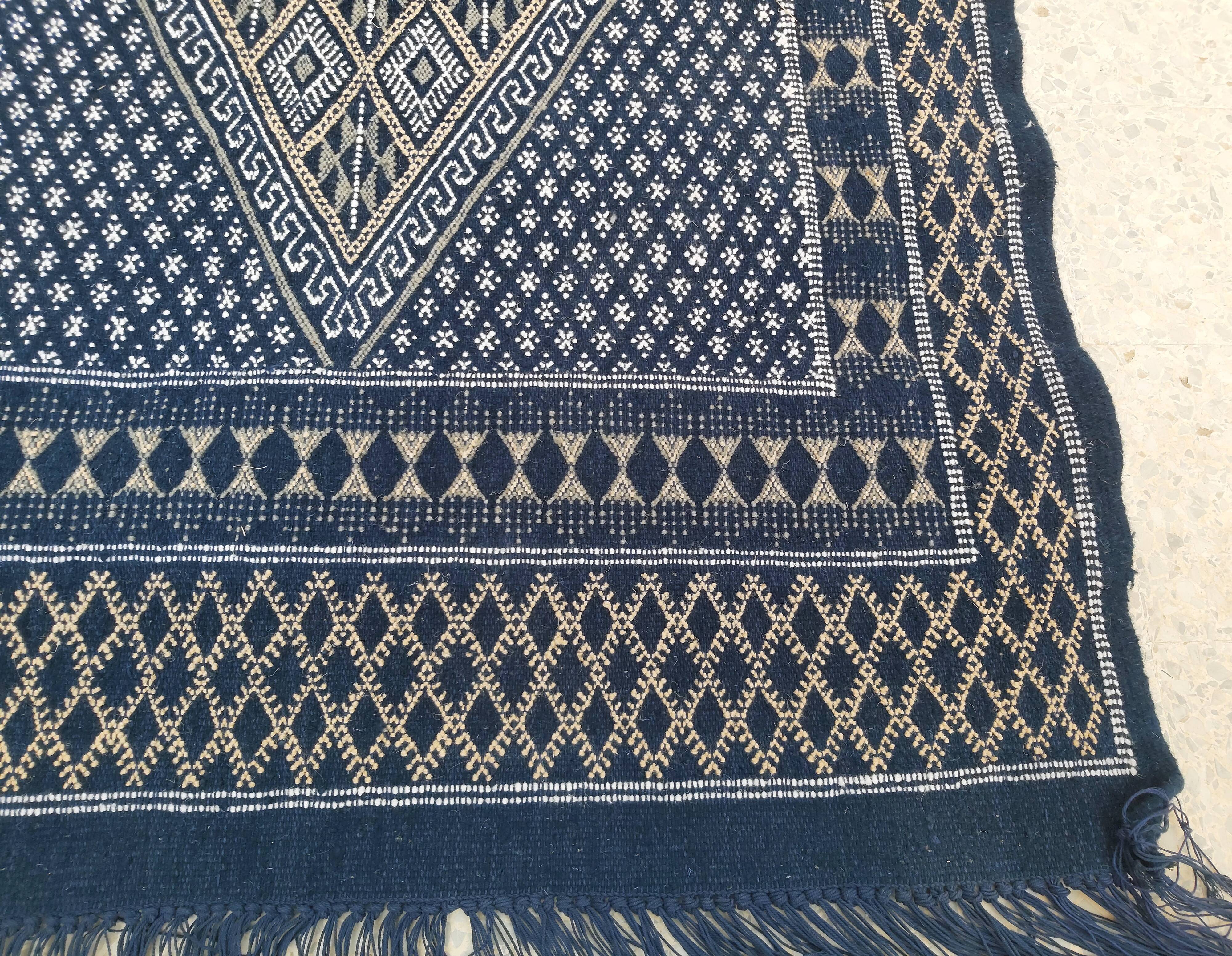 Hand-woven blue carpet in pure wool