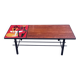 1970s design coffee table with ceramic and wood top, metal legs.