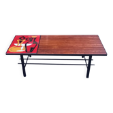 1970s design coffee table with ceramic and wood top, metal legs.