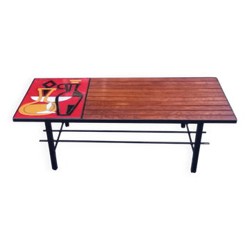 1970s design coffee table with ceramic and wood top, metal legs.