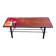 1970s design coffee table with ceramic and wood top, metal legs.
