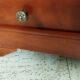 Louis Philippe style coffee table in cherry wood with large drawers.