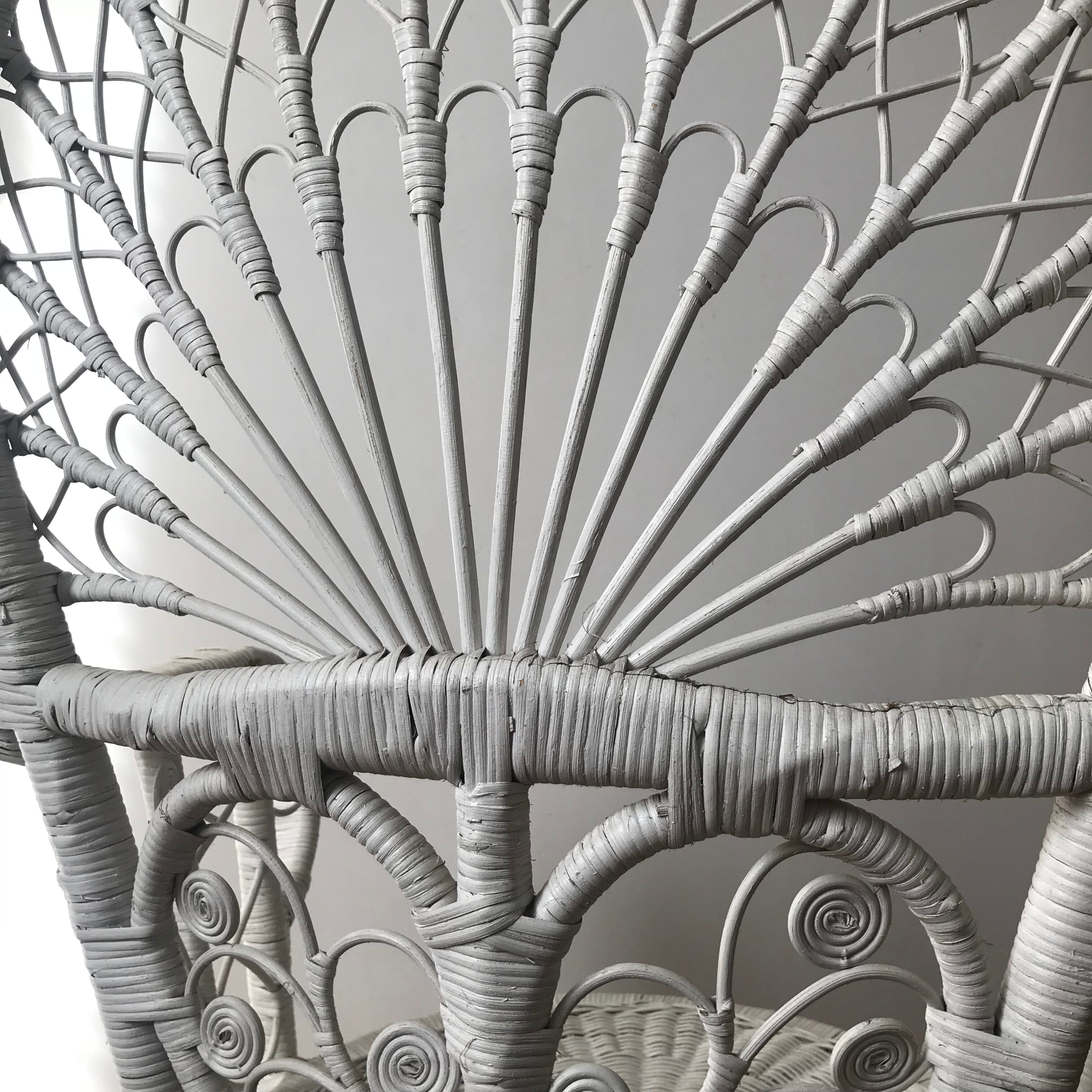 White peacock rattan chair