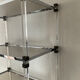 Vintage shelf in lucite, brass, and smoked glass from the 1970s.